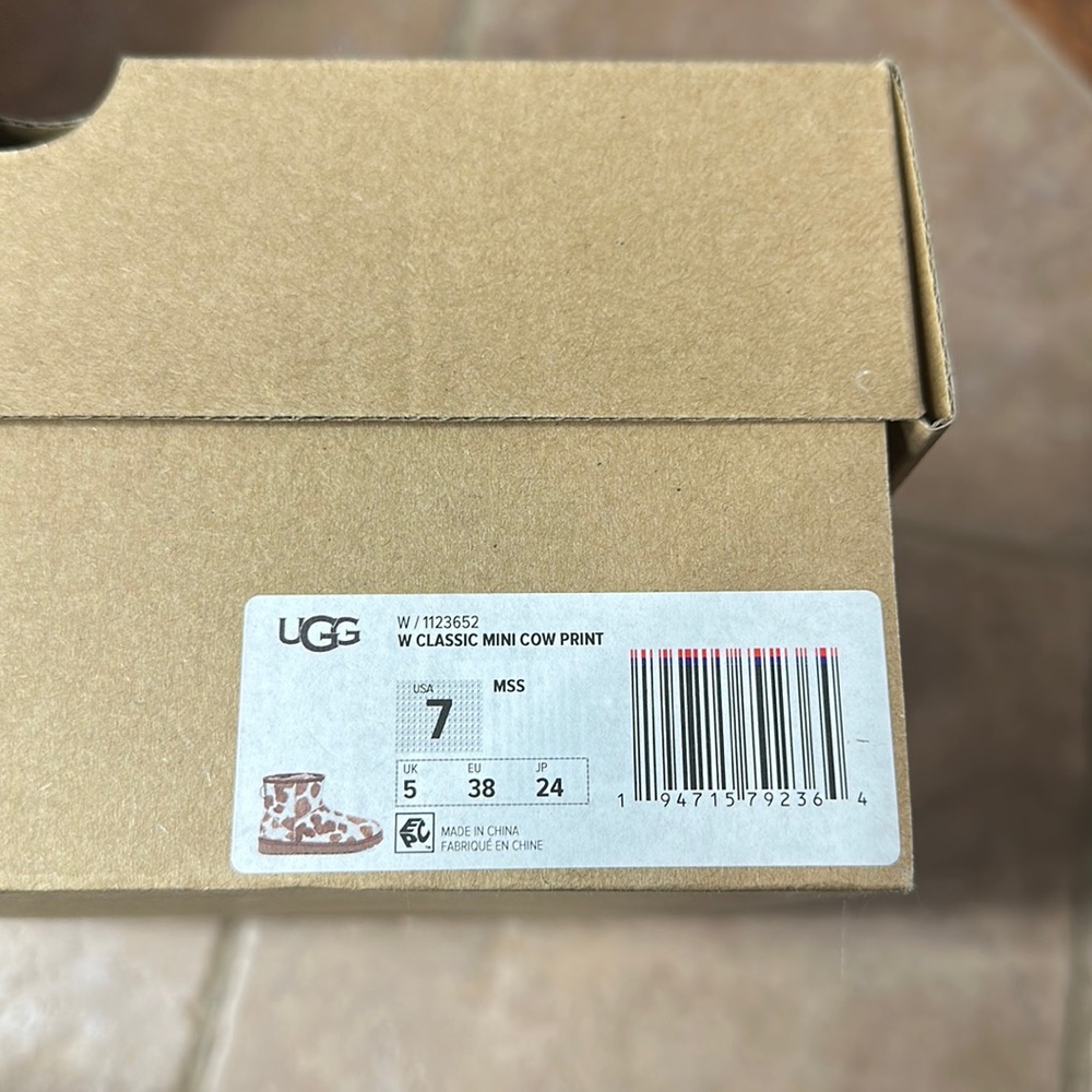 Ugg mini cow print boots